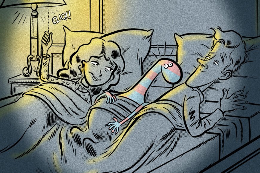 Man and woman smiling in bed with a colorful creature while woman turns off lamp.