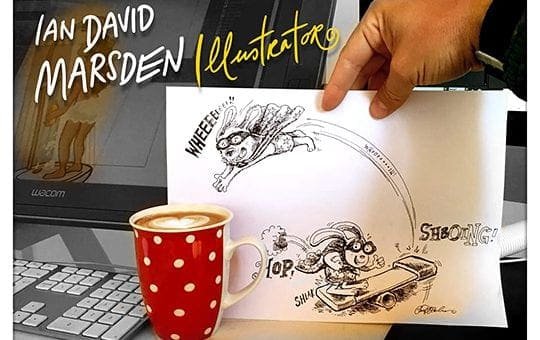 Hand holding a cartoon sketch with skateboard, desk setup with polka dot coffee cup.