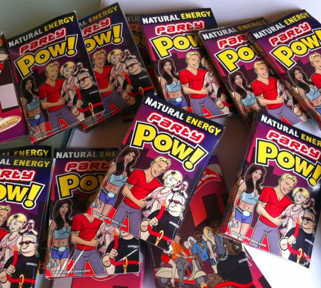 Multiple Natural Energy Party Pow! packages with colorful cartoon characters.
