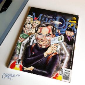 MacDirectory cover features caricature with device, colorful attire, flying objects, and cartoons.
