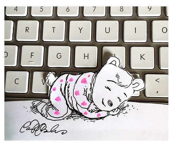 Photo of a hand-drawn paper figure napping on a computer keyboard — lo-fi rebellion meets charm.