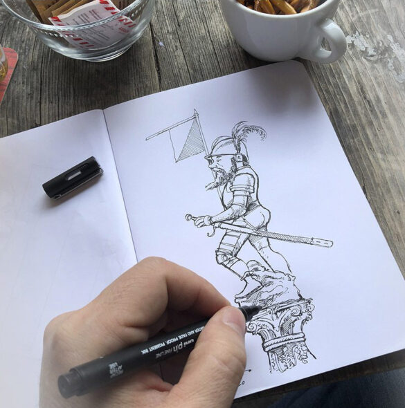 lose-up photo of artist drawing knight figure of Zürich’s Stüssibrunnen statue with black marker.