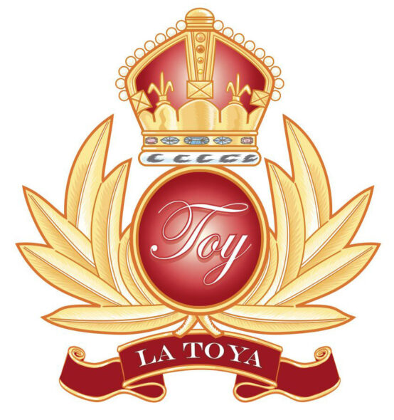 Golden crown and laurel, red oval with "Toy," red banner below with "La Toya" in white.