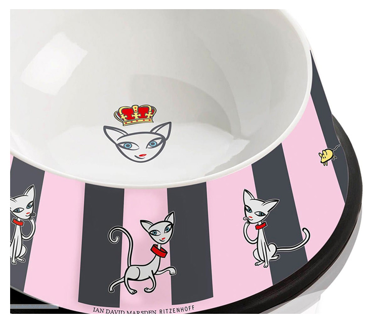 Decorative bowl with stylized cats, red collars, crown, on pink and black stripes.
