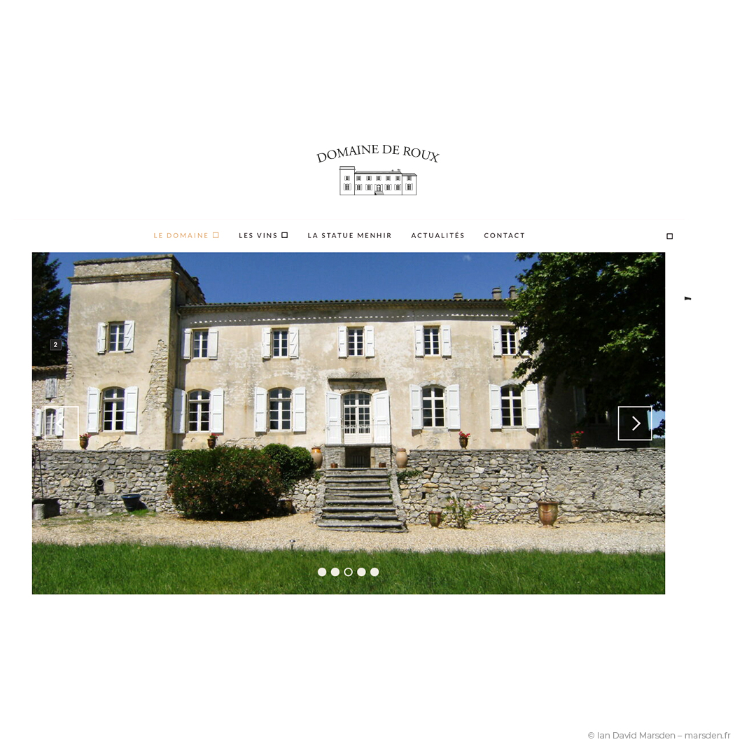 Domaine de Roux winery homepage featuring the château photo and vector logo at top.