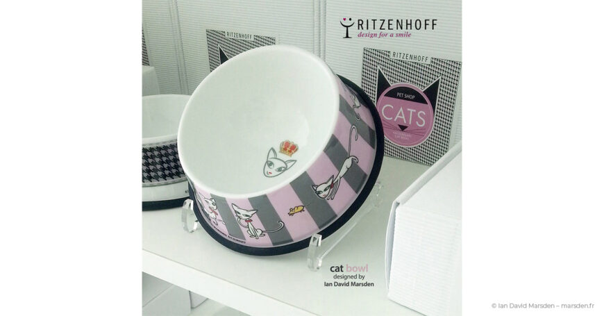 Ceramic cat food bowl with cartoon illustration by Ian Marsden