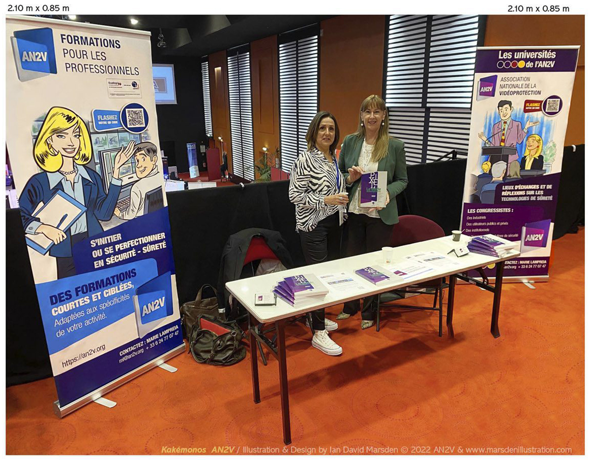 Stand AN2V avec trois kakémonos illustrés et conçus par Ian David Marsden pour une communication événementielle professionnelle autour de la vidéoprotection.