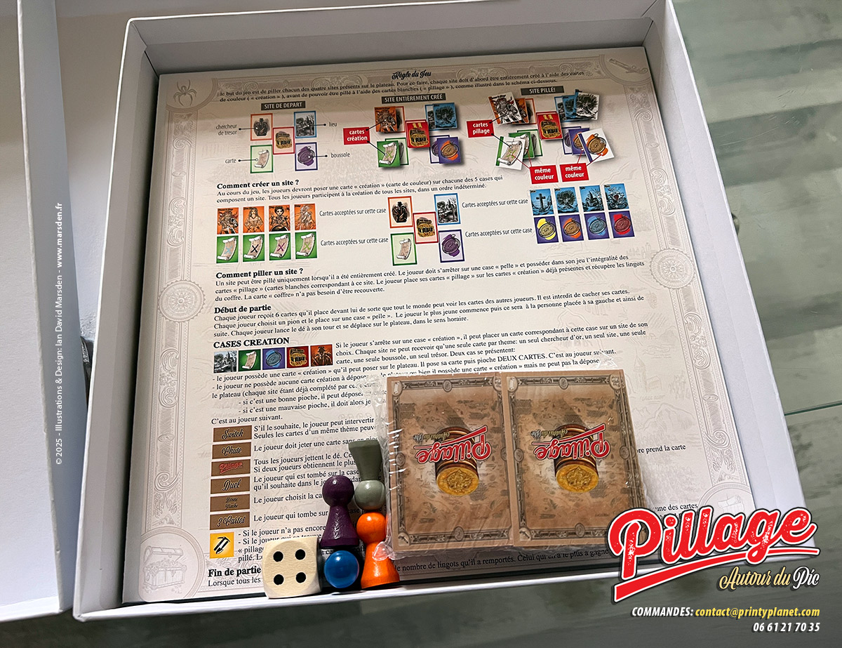 Règles imprimées de Pillage autour du Pic avec schémas, cartes, pictogrammes, pions et éléments de jeu dans la boîte.